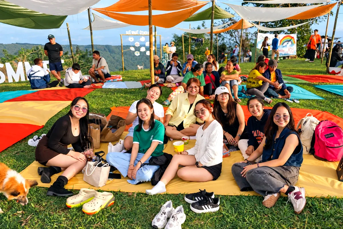 Santa Maria festival-goers gathered on colorful picnic mats in Sierra Madre